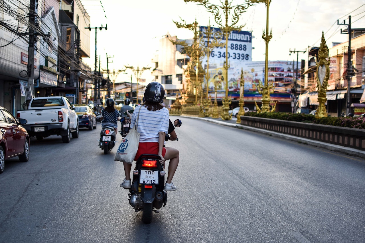 People riding motorcycles in Thailand
