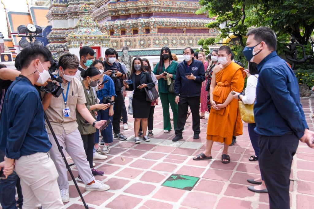 People visiting Wat Pho.