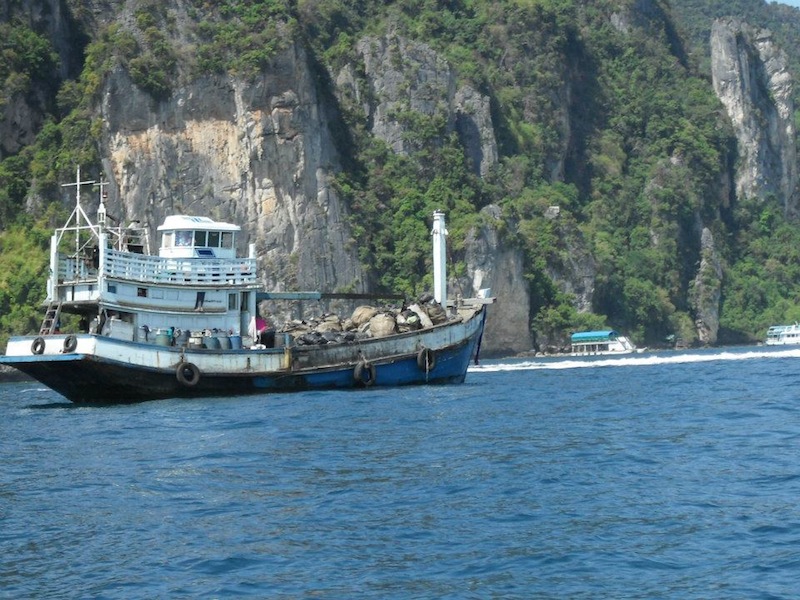 Garbage boat on Phi Phi Islands