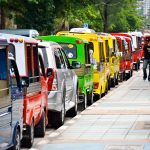 Row of Tuk-Tuks on Thawiwong Road in Patong Beach, Phuket