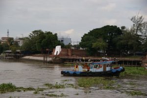 A boat and Pom Phet fortress in Ayutthaya