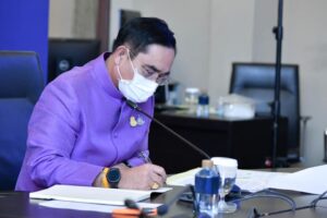 PM Prayut Chan-ocha working at the Government office