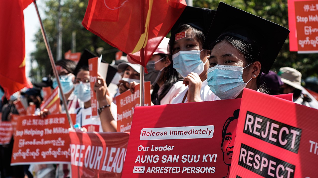Release aung san suu kyi banners at protest in Myanmar against Military Coup