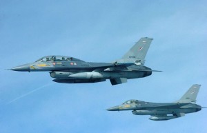 Two Royal Thai Air Force F-16 aircraft fly in formation