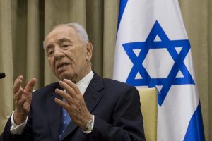 Former Israeli President Shimon Peres speaks during a meeting in Jerusalem, April 22, 2013