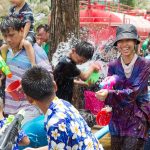 Pattaya Teenager Flashes Two Guns During Songkran