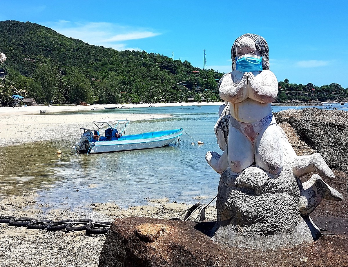 Statue wearing a face mask during the COVID-19 coronavirus outbreak in Thailand