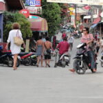Tourists on Haad Rin in Koh Phangan, Thailand.