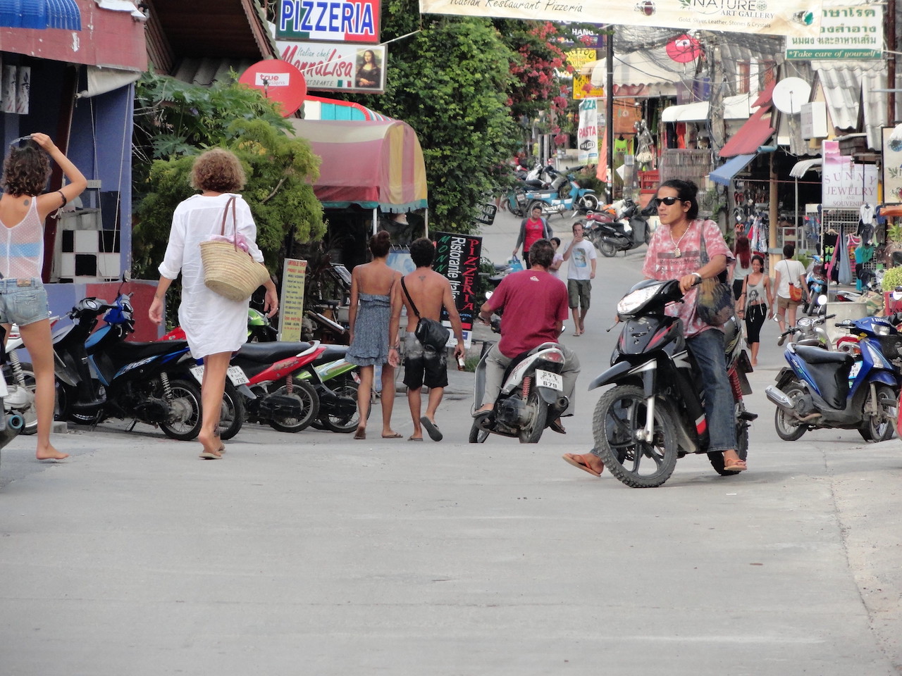 Tourists on Haad Rin in Koh Phangan, Thailand.