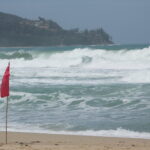 Strong waves and red flag on Surin Beach in Phuket.