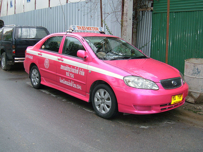 Pink Toyota Corolla E120 taxi in Bangkok