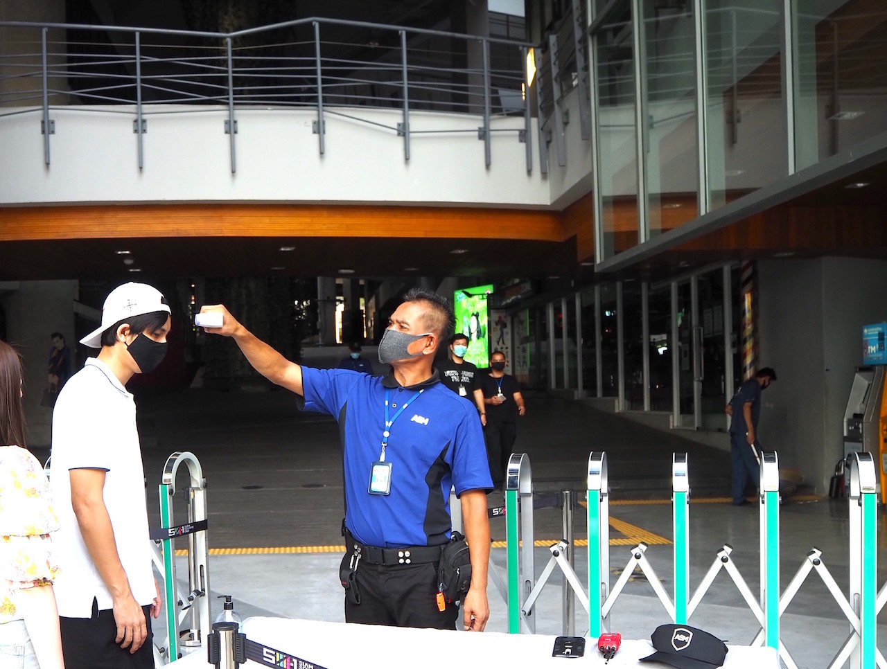 Temperature check point at Siam Square One shopping mall in Bangkok