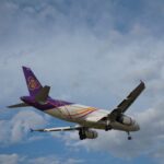 Thai Airways airplane landing at Phuket Airport