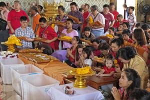 Thai Buddhists celebrating the Makha Bucha Day