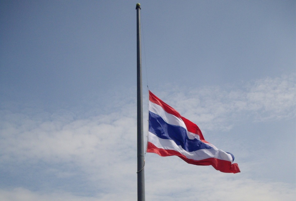 Thai national flag flying half-mast for mourning to HRH Princess Galyani Vadhana at Bangkok Bus Terminal Chatuchak in Bangkok