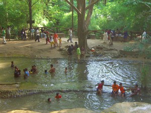 People bathing in a waterfall in Kanchanaburi