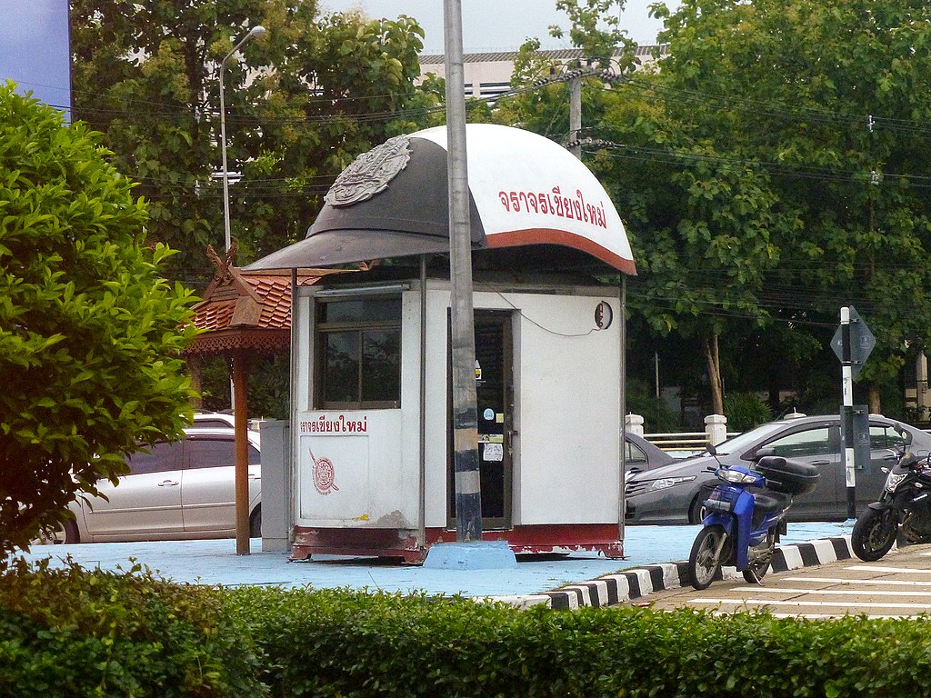 Thai police booth with a police helmet as a roof