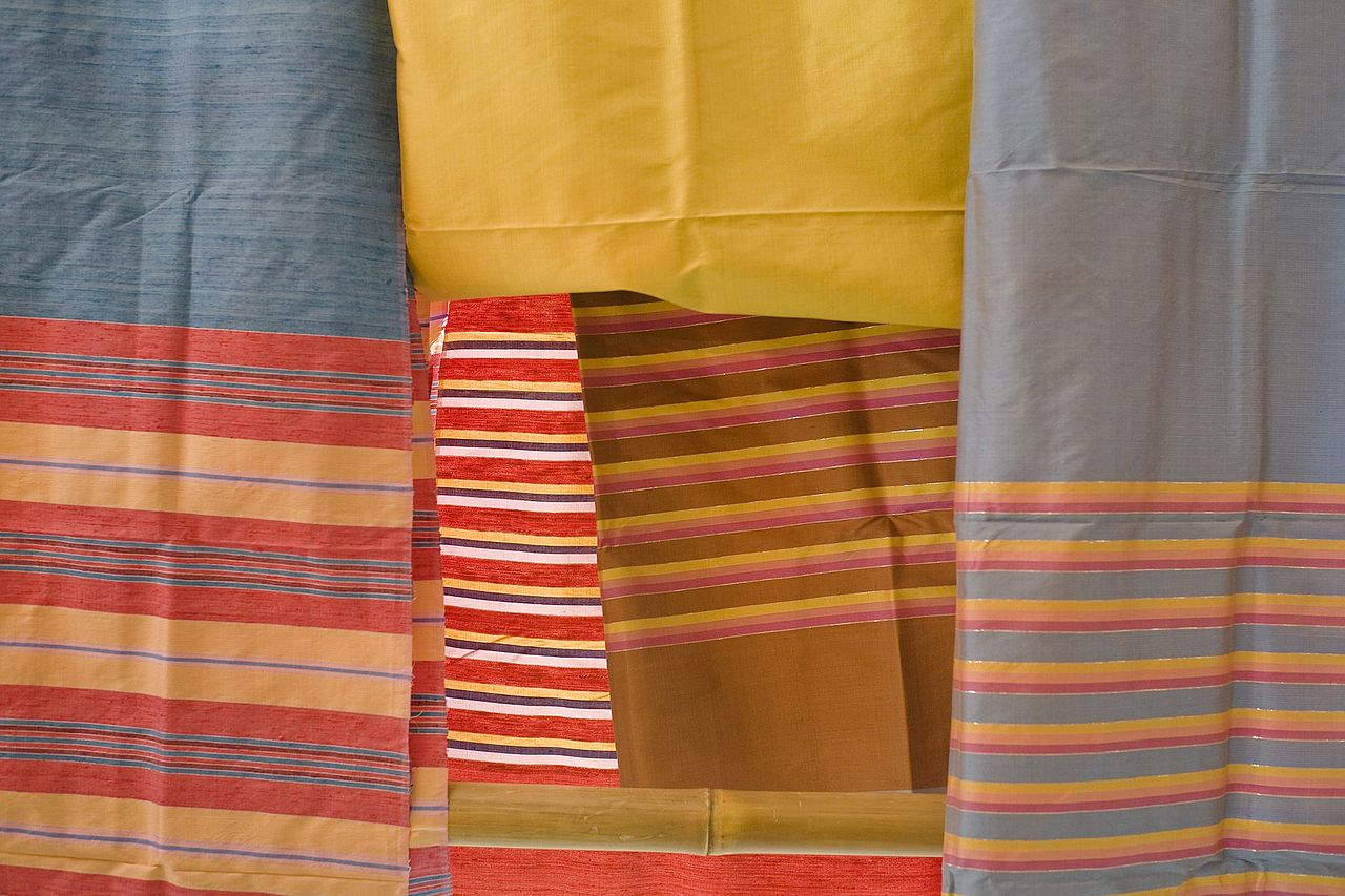 Colorful Thai fabrics. Textile clothes in Thailand.