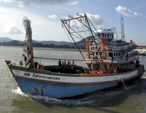 Thai fishing boat leaving Phuket harbour