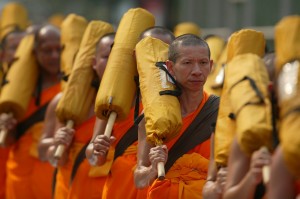 Buddhist monks dressed with orange robes