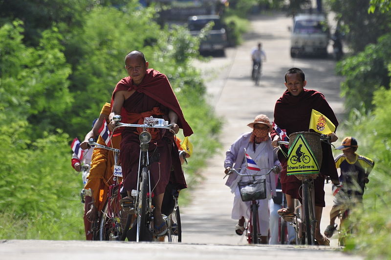 Thai Monks riding bicycles