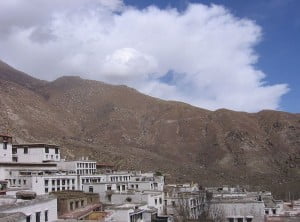 View of Tibet's Drepung 'Bras-spungs, Zhaibung' Monastery, on the outskirts of Lhasa, and the surrounding mountains