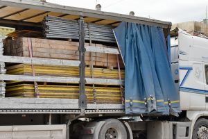 A trailer loaded with construction materials in Thailand.