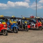Tuk tuks waiting for customers in Chon Buri