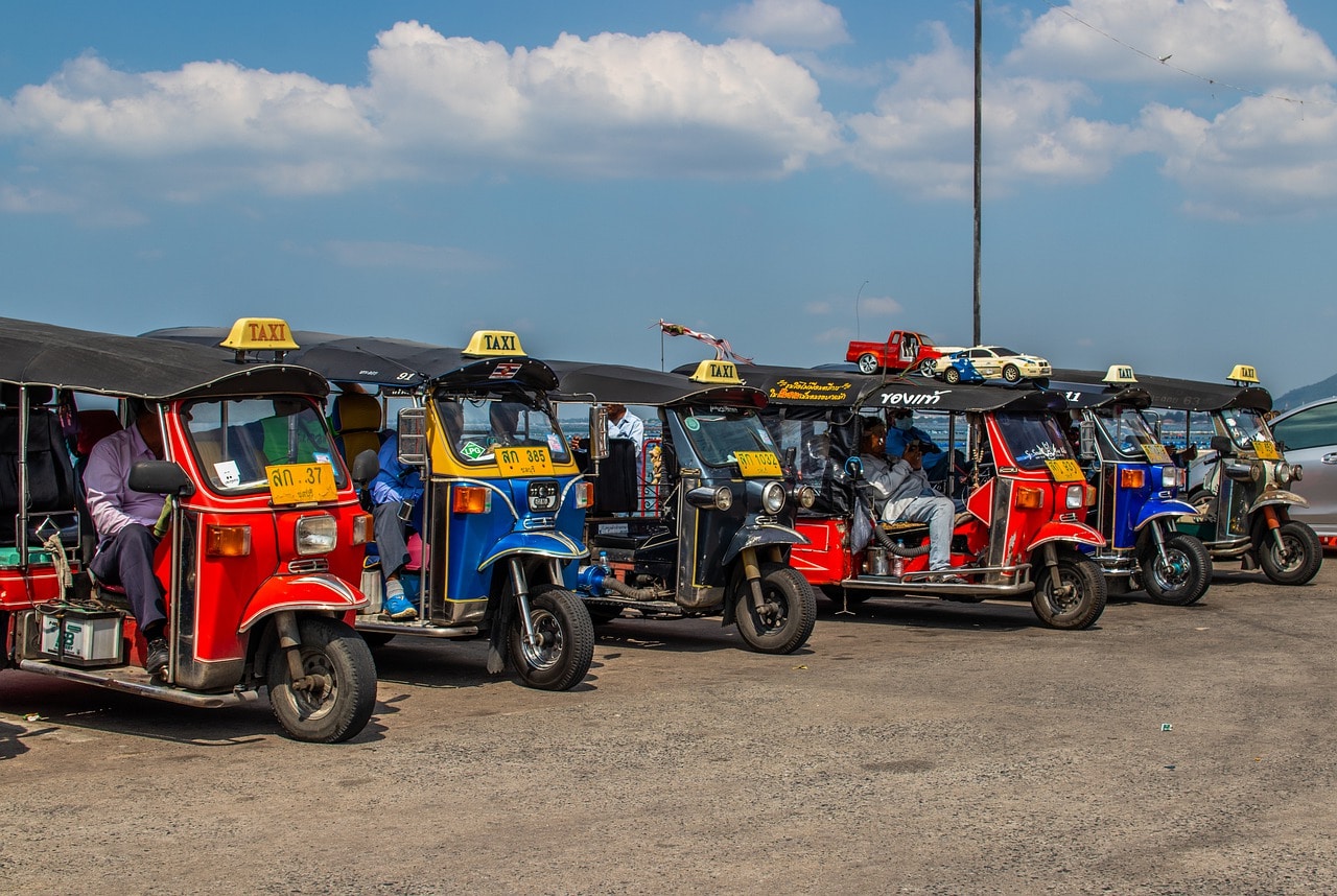 Tuk tuks waiting for customers in Chon Buri
