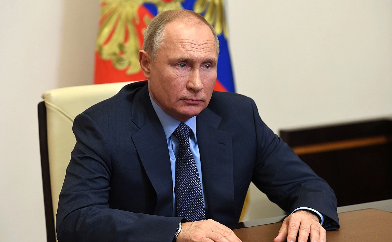 Vladimir Putin during a meeting with Gazprom CEO Alexei Miller