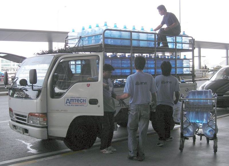 Isuzu ELF 150 with water bottles