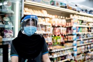 Woman protected with mask and face shield during the COVID-19 pandemic in Thailand