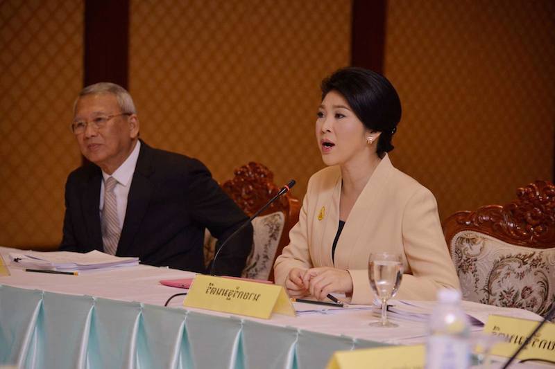 Yingluck Shinawatra and Niwatthamrong Boonsongpaisan