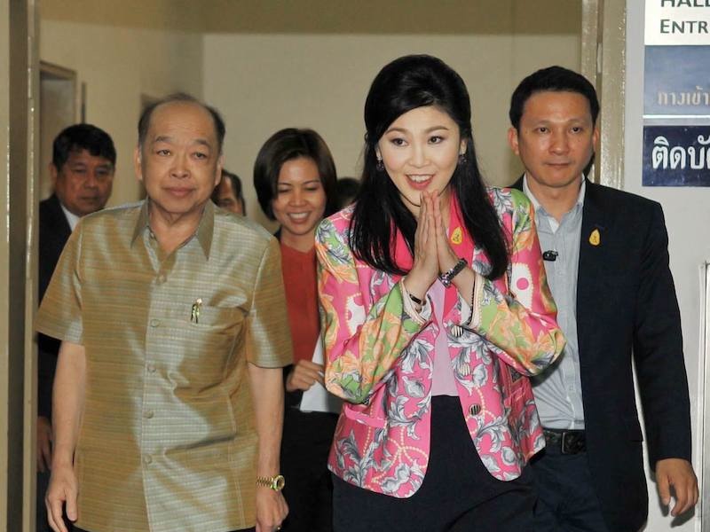 Former Prime Minister Yingluck Shinawatra and cabinet members