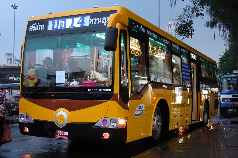 Yellow bus in Bangkok, Thailand. Zhong Tong chassis, bodywork by Thonburi Bus Body Co., Ltd.