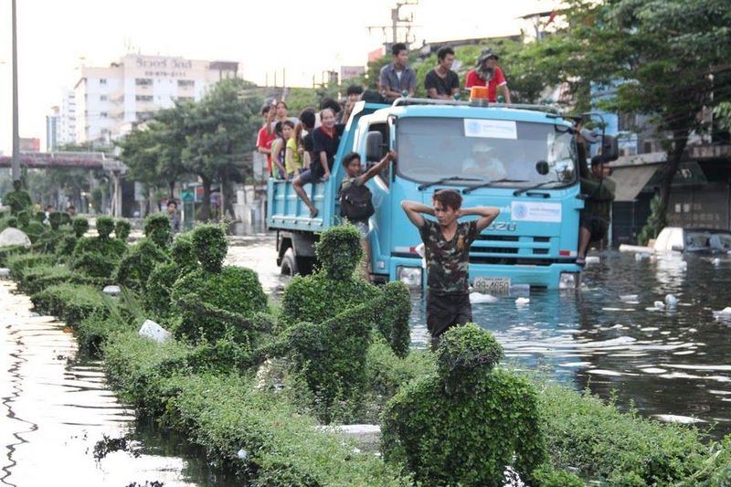 Bangkok residents evacuate flooded neighborhoods