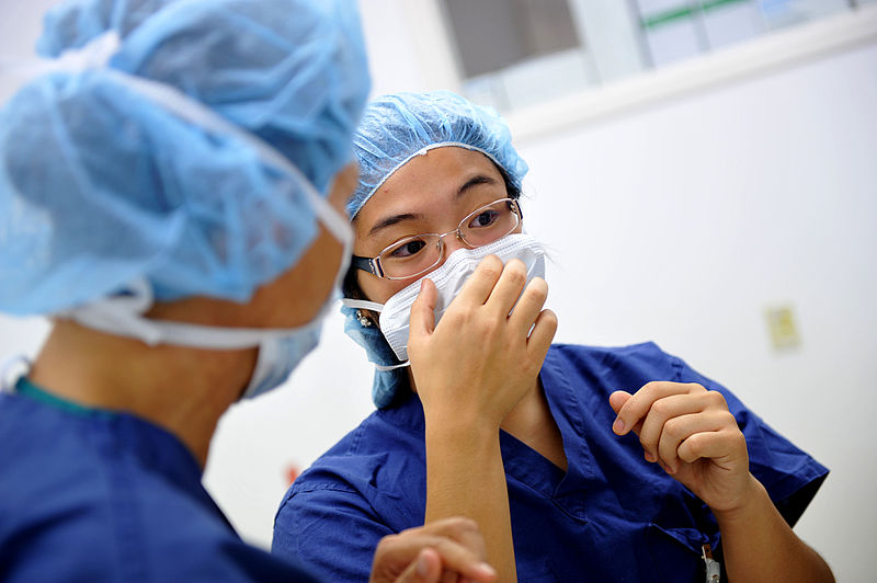 Doctors wearing surgical masks
