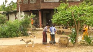 Women outside a house in Northeastern Thailand (Isan)