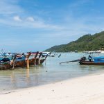 Long-tail boats on a beach