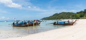 Long-tail boats on a beach