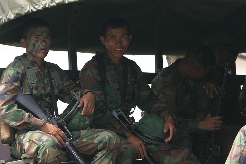 Royal Thai marines sit in the back of a troop carrier during exercise Cobra Gold 2010 at Utapao Air Base, Rayong province