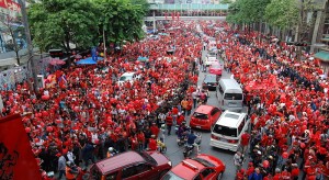 Red Shirt protest at Ratchaprasong intersection in Bangkok. The red shirts organised mass rallies across Thailand to mark the ousting of former Thai prime minister Thaksin by a military coup 4 years ago, and to commemorate the final day of the military crackdown on their protests 4 months ago