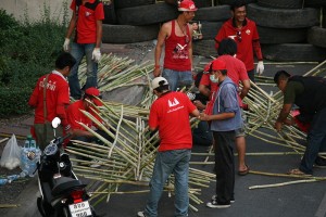 Red Shirts building a bamboo barricade on 14th May 2010 at the protest site in Bangkok