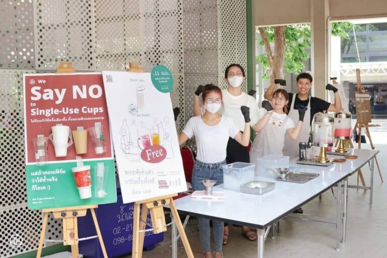 "We Say No to Single-Use Cups" banner.