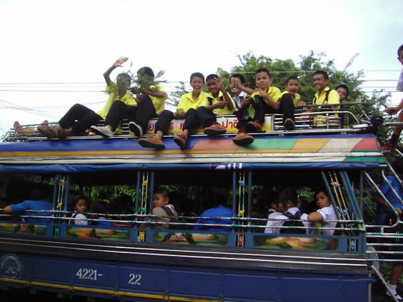 Bus transporting children home from school in Yasothon