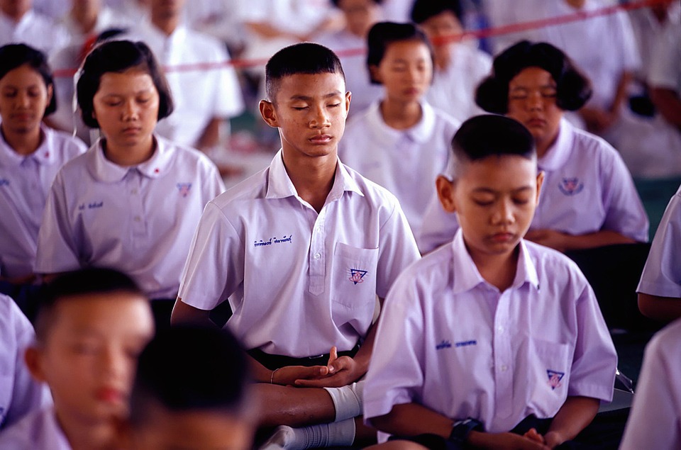 Thai students practicing Yoga
