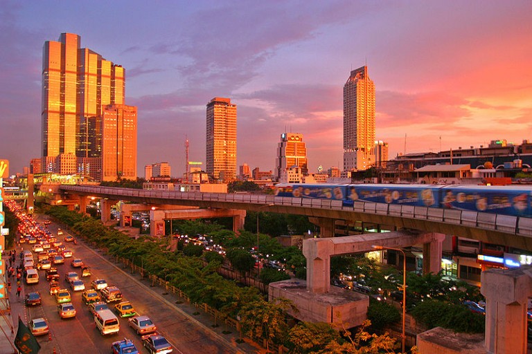 Bangkok skyline and skytrain on sunset