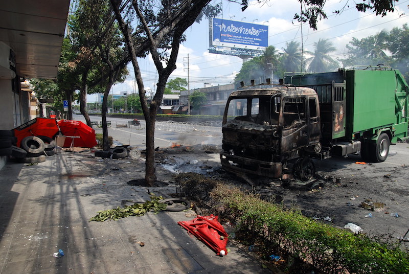 A burned out truck blocking Rama 4 road in Bangkok during Red Shirt protetsts