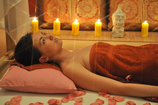 Woman getting Thai massage.