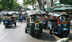 Tuk tuks in front of Pak Klong Market, Bangkok
